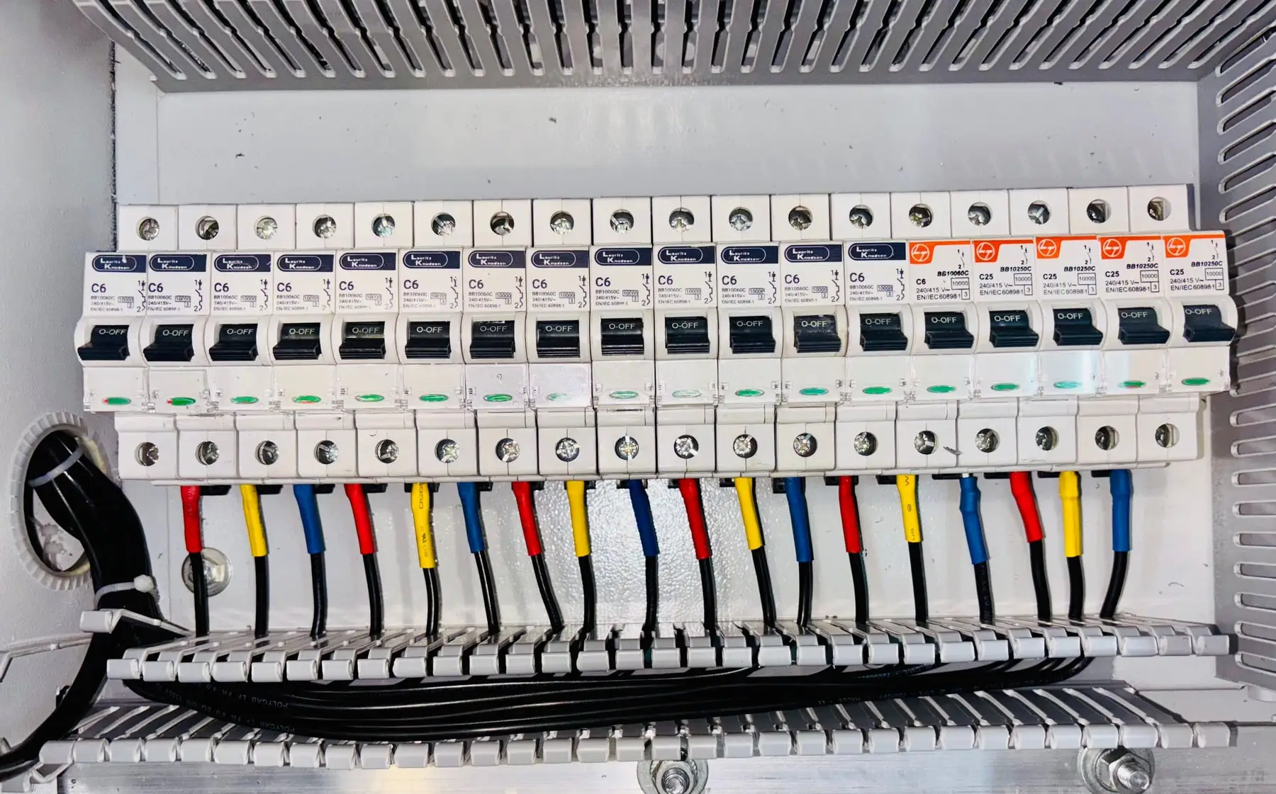 An open residential switchboard with the circuit labelling visible