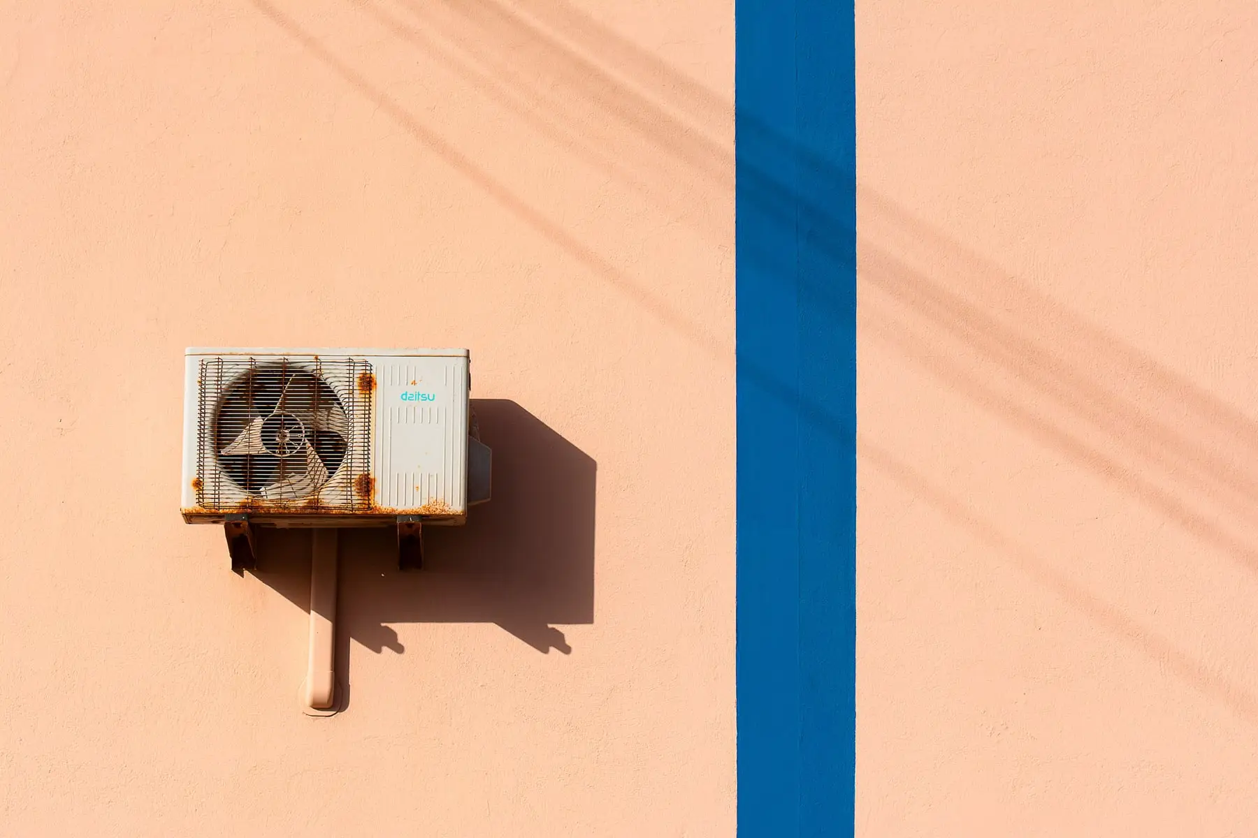 A corroded outdoor unit at the end of its service life